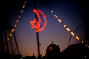 Masjid Al-Aqsa - seen through festive Ramadan lights (2009 - AP Photo/Bernat Armangue)