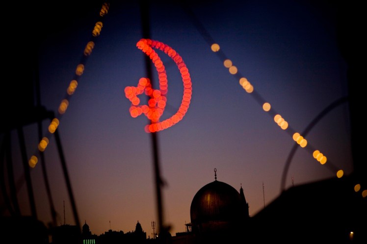 Masjid Al-Aqsa - seen through festive Ramadan lights (2009 - AP Photo/Bernat Armangue)
